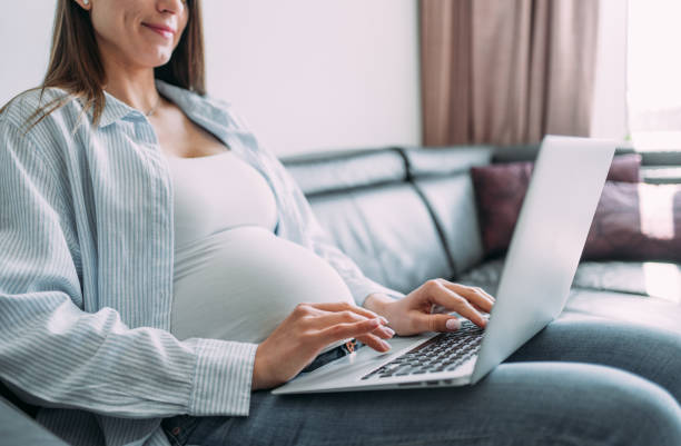 istock Pregnant woman working from home. 1429977924