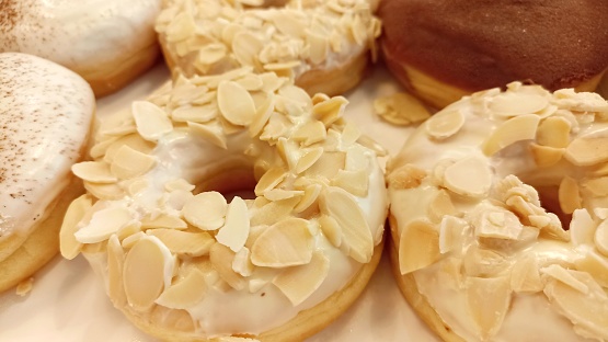 delicious almond donuts in a box