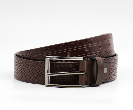 fastened fashionable men's leather belt with  metal buckle isolated on white background