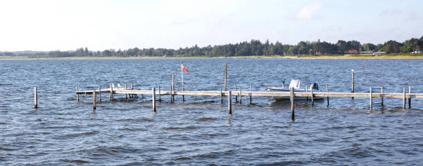 istock Seascape tranquil background with room for text, broken jetty 1429980946