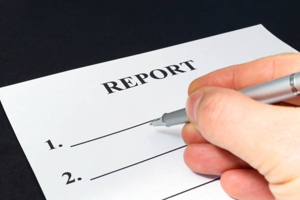 istock We are preparing a report - a form to fill in on a black table. 1429984750