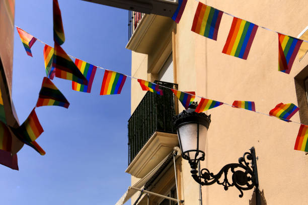 istock Streets and facades adorned with rainbow flags in Benidorm 1429985997