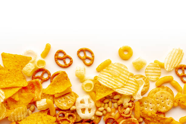 istock Salty snacks on a white background with copy space. Party mix 1429986559