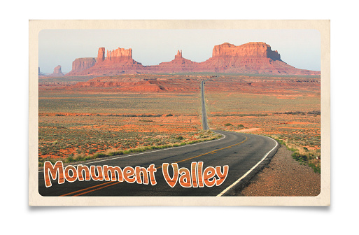 Vintage postcard of Monument Valley, showing U.S. Route 163 crossing the border between Utah and Arizona. Tourist destinations in Western USA, traveling on the road. Composite image with clipping path on white background.