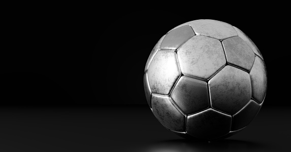 Silver football soccer ball on black. Award