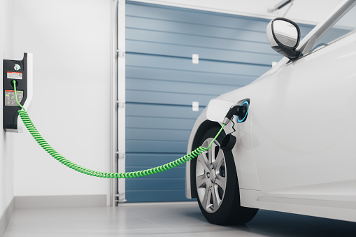 Generic electric vehicle charging in a residential garage.