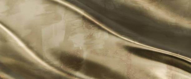 istock abstract gold background, soft and smooth golden background. 1429992421
