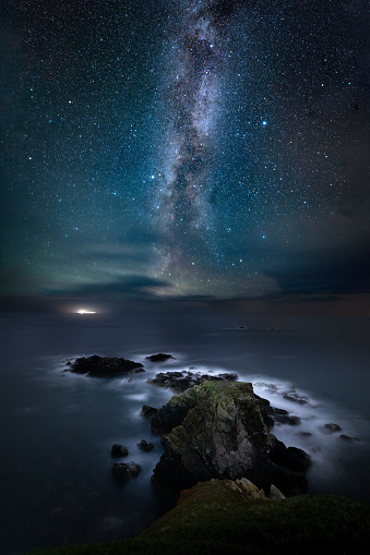 The most southerly point of mainland Britain photographed at night in front of the Milky Way galaxy.