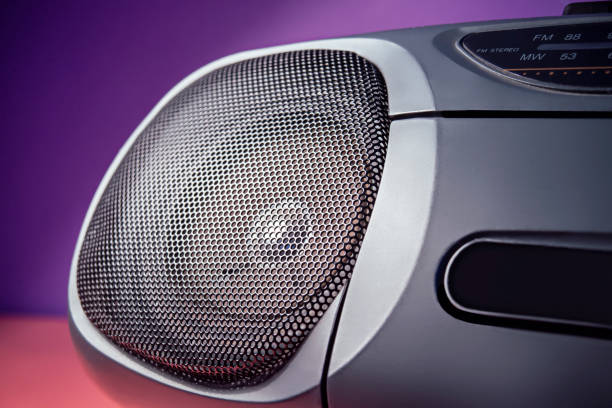 istock Close up stereo tape deck speaker in 90's color theme 1429992650