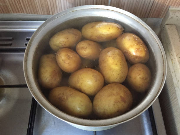 istock Potatoes boiling in a pot of water 1429995982