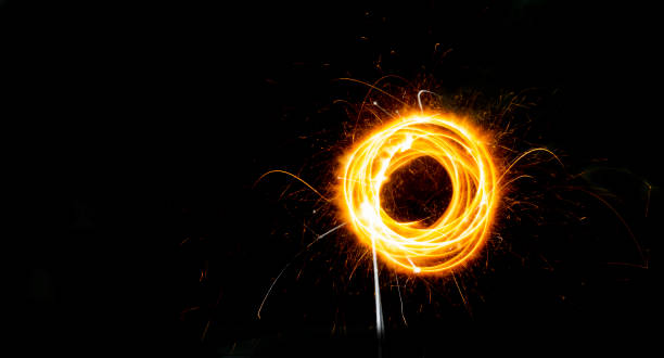 istock Celebration with sparkles fire in circle on black banner background 1430001206