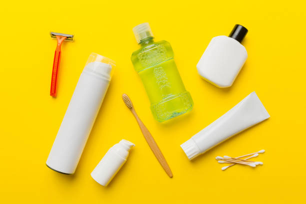 istock Mockup for bathing products top view flat lay, spa razor, toothpaste, soap, gel and other various accessories. Cosmetics for skin health. Bath Mockup for your logo 1430004384