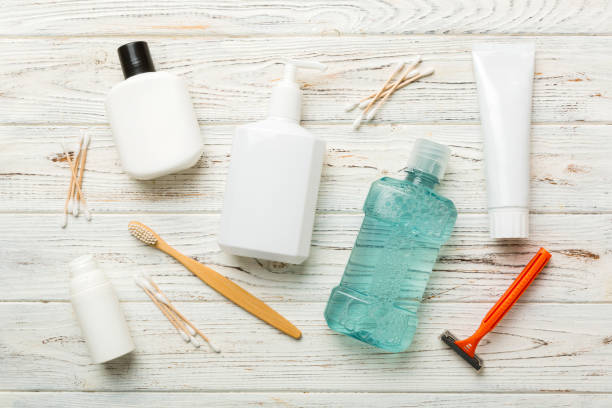 istock Mockup for bathing products top view flat lay, spa razor, toothpaste, soap, gel and other various accessories. Cosmetics for skin health. Bath Mockup for your logo 1430004403