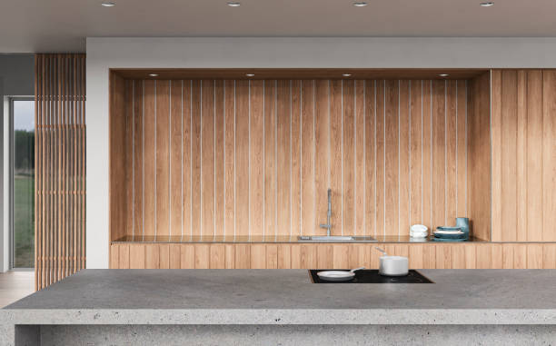 istock A close up of a modern white kitchen with rectangular gray concrete breakfast kitchen island 1430006824