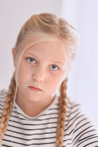 Natural light photo of a fair haired child.