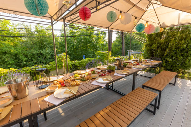 istock Food served outdoor on a long table 1430011133
