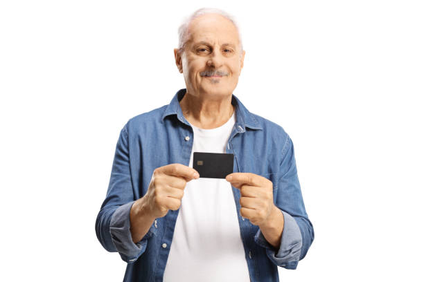 istock Mature man holding a credit card 1430011270