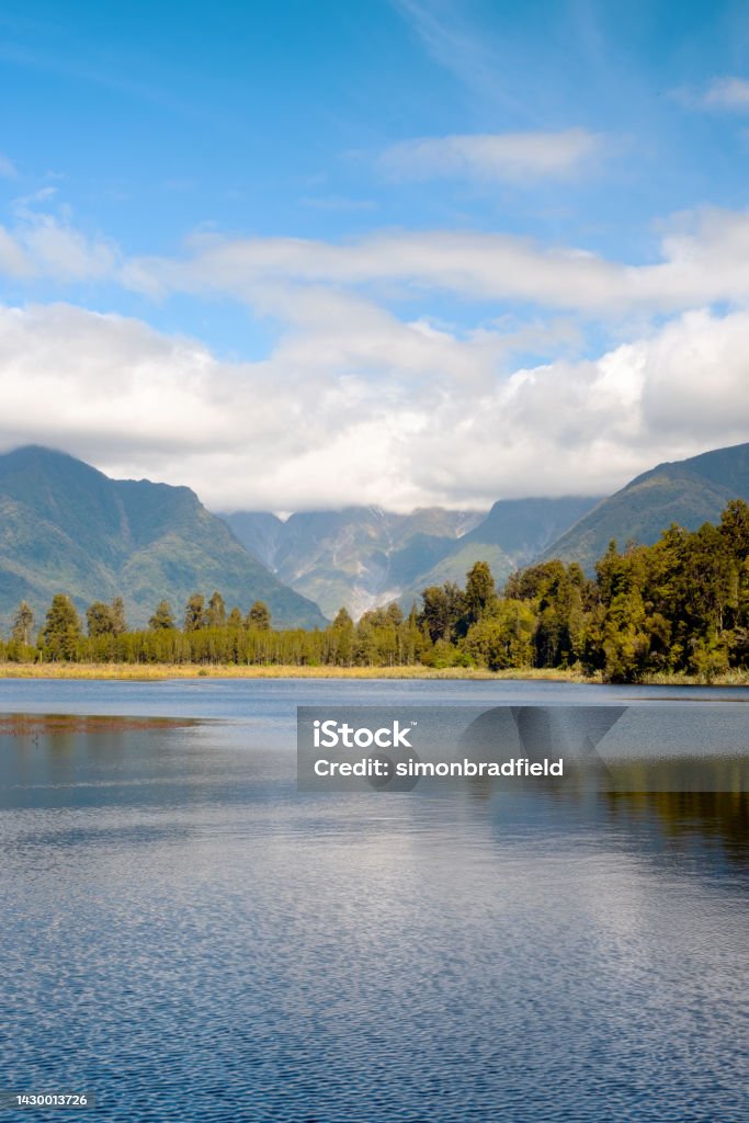 Lake Matheson, On New Zealand's South Island Spectacular Lake Matheson on New Zealand's South Island Beauty In Nature Stock Photo