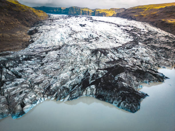 istock Icelandic glacier melting with ice flowing away due to climate change 1430016437