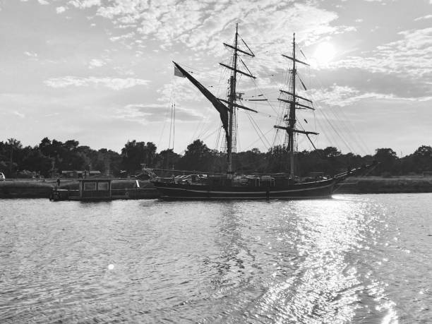 Ship from an old age sails of in a canal in northern Sweden