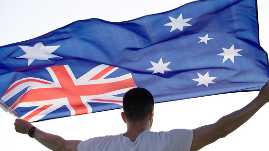 Young man with Australian flag.