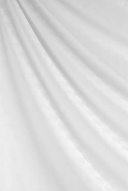 istock draped red silk fabric of satin weave, texture, background 1430035707