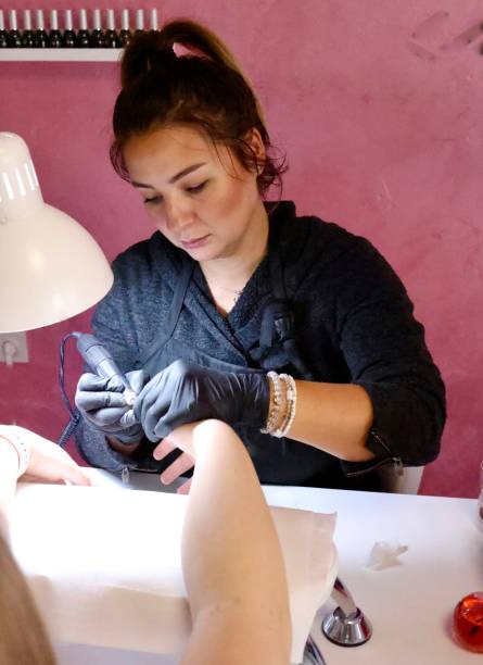 istock Girl is doing a manicure 1430035985