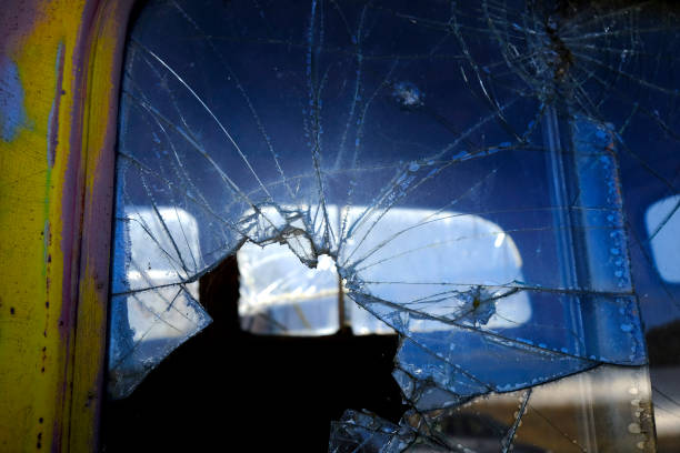 istock Broken Glass on Old Vehicle Abandoned and Damaged 1430037930