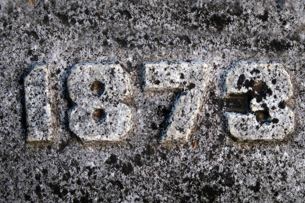istock Roughly Carved Numbers in Stone 1873 1430037964
