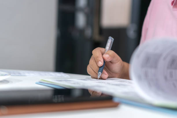 istock Document report in Business people manager checking finance paperwork and signing documents reports on paper files in meeting room, checking data contract partner deal workplace office 1430038797