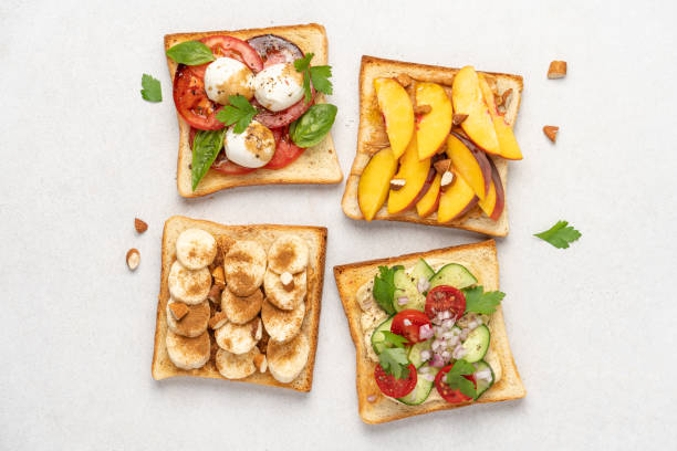 istock Set of various toasts on white background, top view 1430039920