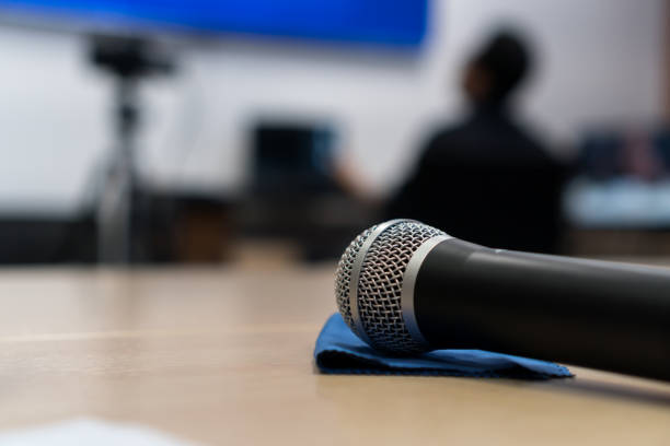 istock Microphone for speaker speech in conference hall or meeting room 1430040253