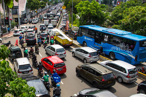 Jakarta, Indonesia - March 11, 2021 : Heavy traffic jam, on veteran road, central jakarta, during rush hour.
