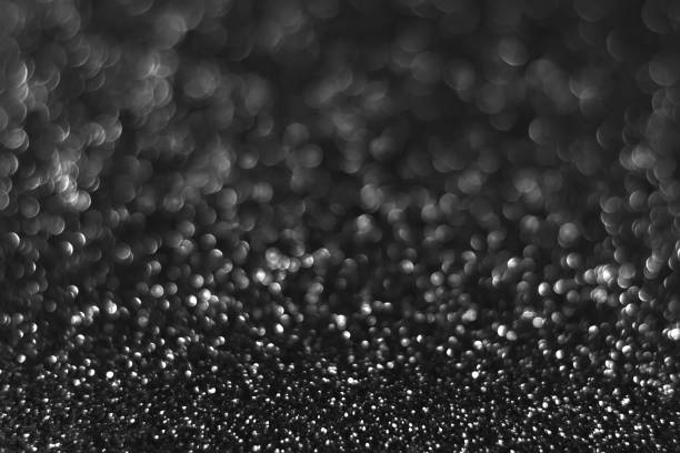 istock Gray black sparkling glitter bokeh background 1430041130