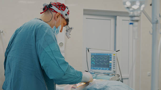 istock The surgeon makes an operation with the help of a nurse 1430041795