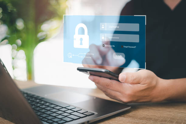istock Cybersecurity internet and networking concept. Close up hand a man hold smartphone and login to security and encryption Security system in personal internet system 1430044600