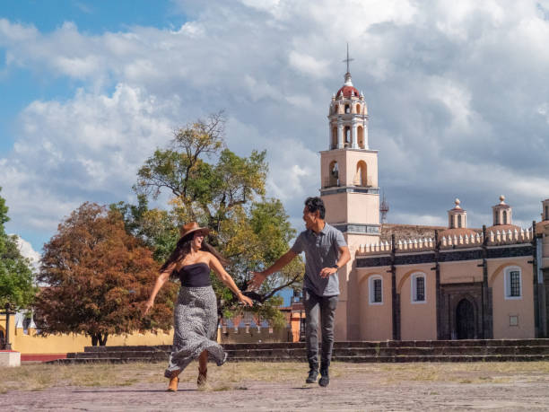 istock Happy Multiracial couple visiting a Mexican village 1430048710