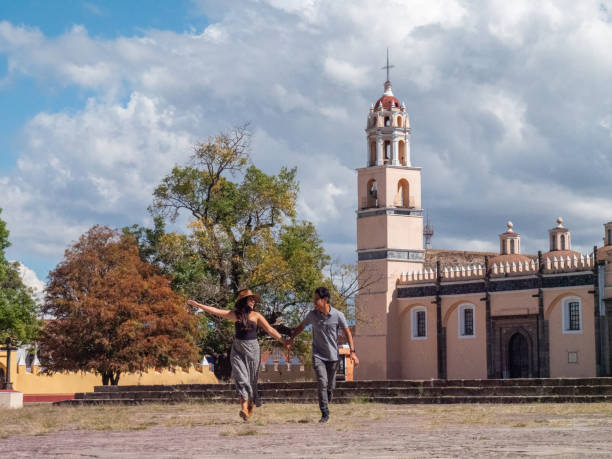 istock Happy Multiracial couple visiting a Mexican village 1430048719