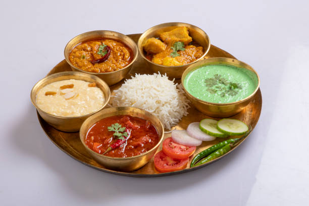 istock Indian Veg Thali / food platter, selective focus isolated on white background 1430049763