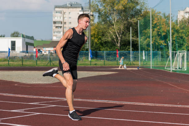 istock Young woman running on the running track 1430051193