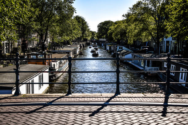 istock Amstel River Canal View From Bridge In Amsterdam, The Netherlands 1430052881