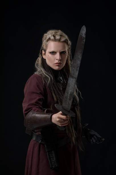 istock Weapon wielding Russian viking warrior queen in studio shot 1430053683
