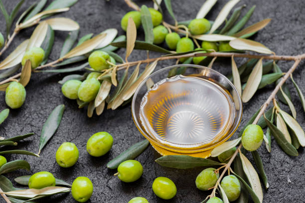 istock Raw green olives and olive oil 1430056059