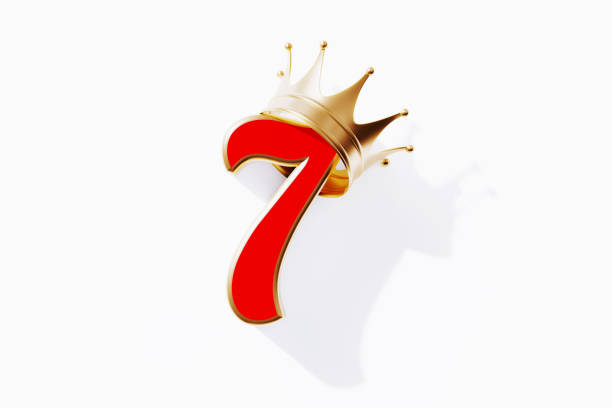 istock Number Seven With Gold Crown Isolated On White Background 1430056079