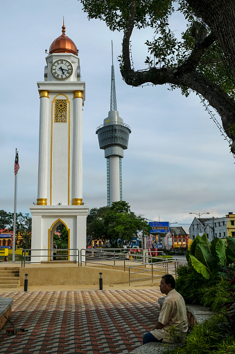 Kuantan, Malaysia - September 2022: Views of Kuantan Clock Tower and the Kuantan 188 tower, formerly known as Menara Teruntum on September 24, 2022 in Kuantan, Malaysia.