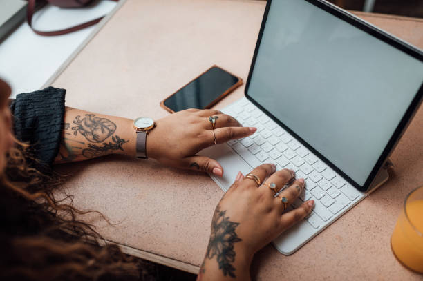 istock Woman working remotely from a cafe 1430059903