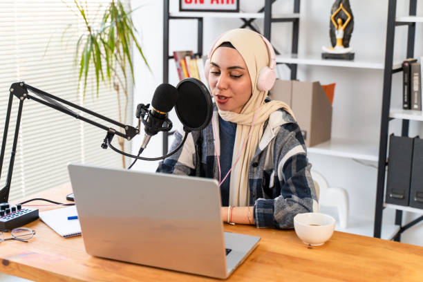 istock Muslim Female podcaster live streaming show 1430060377