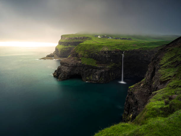 istock Mulafossur Waterfall and Gasadalur Village 1430067342