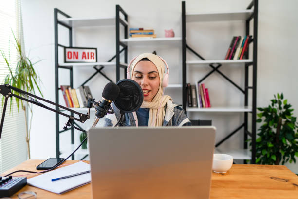 istock Muslim Female podcaster live streaming show 1430070010
