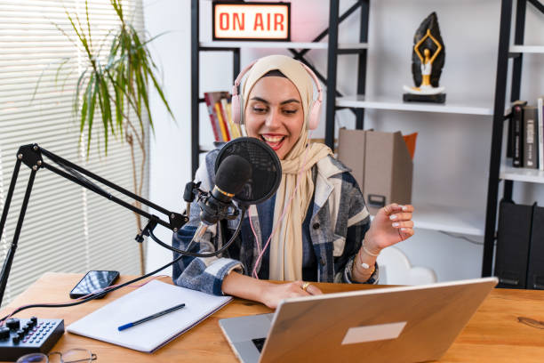 istock Muslim Female podcaster live streaming show 1430071796